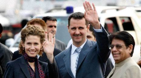الأسد وزوجته أسماء في نيودلهي أمس