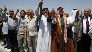 متظاهرون في عمان في شهر يونيو/حزيران