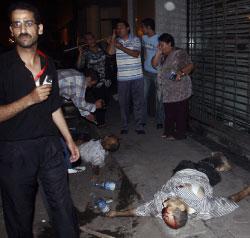 قتيلان من المواجهات أمام مبنى التلفزيون وسط القاهرة (أ ف ب) 