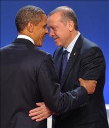 اردوغان والرئيس الاميركي باراك اوباما في قمة مجموعة العشرين في كان الفرنسية امس (رويترز) 