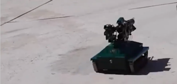 مهندسون سوريون يصنعون روبوت قتالي و الارهابيين يهربون فورا حال
