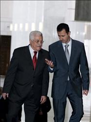 الأسد وعباس خلال لقائهما في دمشق أمس