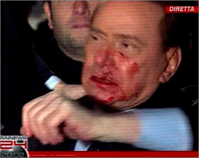 http://www.aljaml.com/files/برلسكوني تعرض للضرب بينما كان يحشد الدعم لحزبه استعدادا للانتخابات.jpg