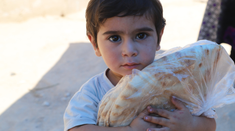 مبادرة في قرية عين التينة بريف اللاذقية لتقاسم رغيف الخبز.png