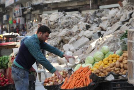 الخسائر المباشرة للقطاع الحكومي بشقيه الخدمي والاقتصادي بلغت أكثر من 800 مليار ليرة سورية (محمد الخطيب ــ أ ف ب)