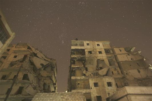 مبان مدمرة في حلب (رويترز)