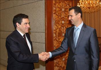 الأسد مستقبلاً فيون في دمشق أمس